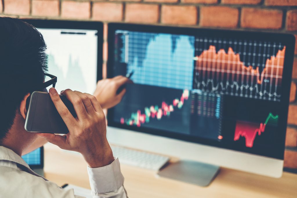 mortgage portfolio buyer looking at computer